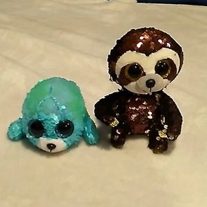 Filp sequence Blue seal and gold sloth plushies